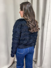 Stylish black sweater with a dreamy, comfortable fit